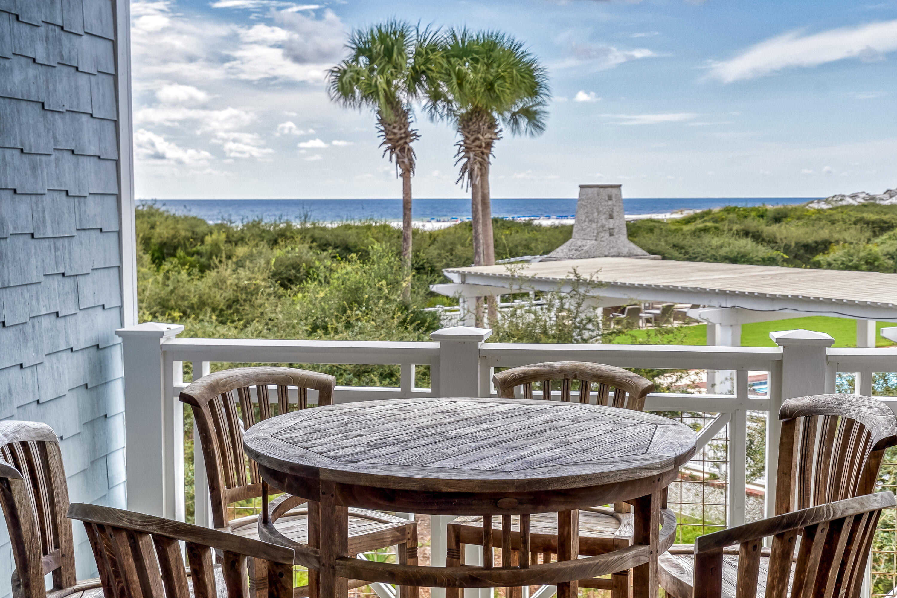 100 Bridge Lane, Unit C112 Watersound, FL 32461 - Photo 3 of 43 a view of a chairs and table in the balcony