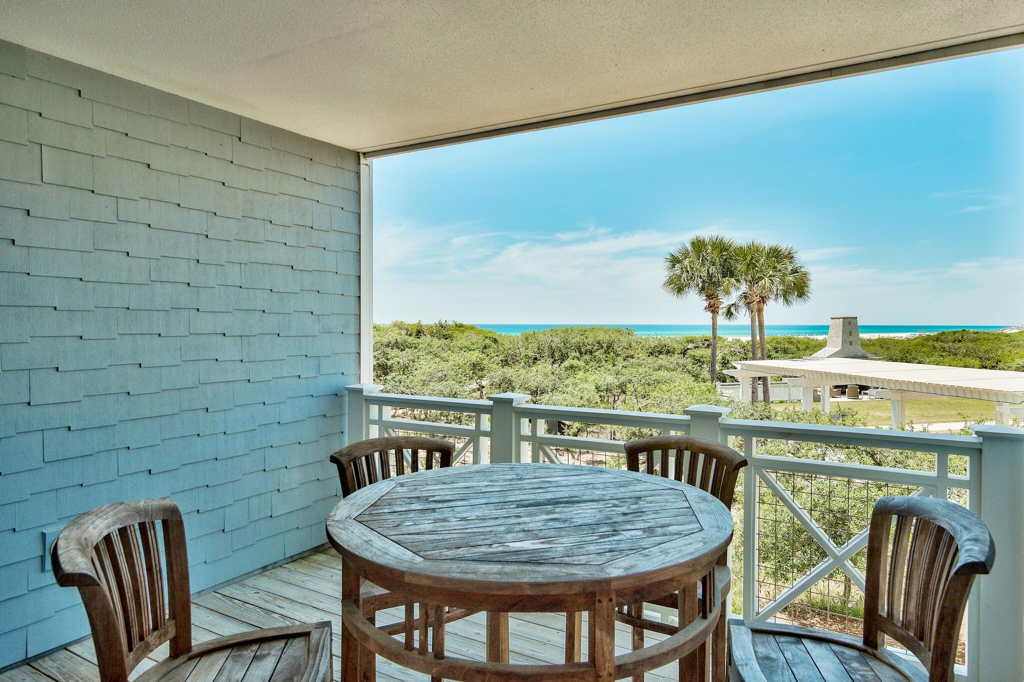 100 Bridge Lane, Unit C112 Watersound, FL 32461 - Photo 37 of 43 a view of a dining room with furniture window and wooden floor