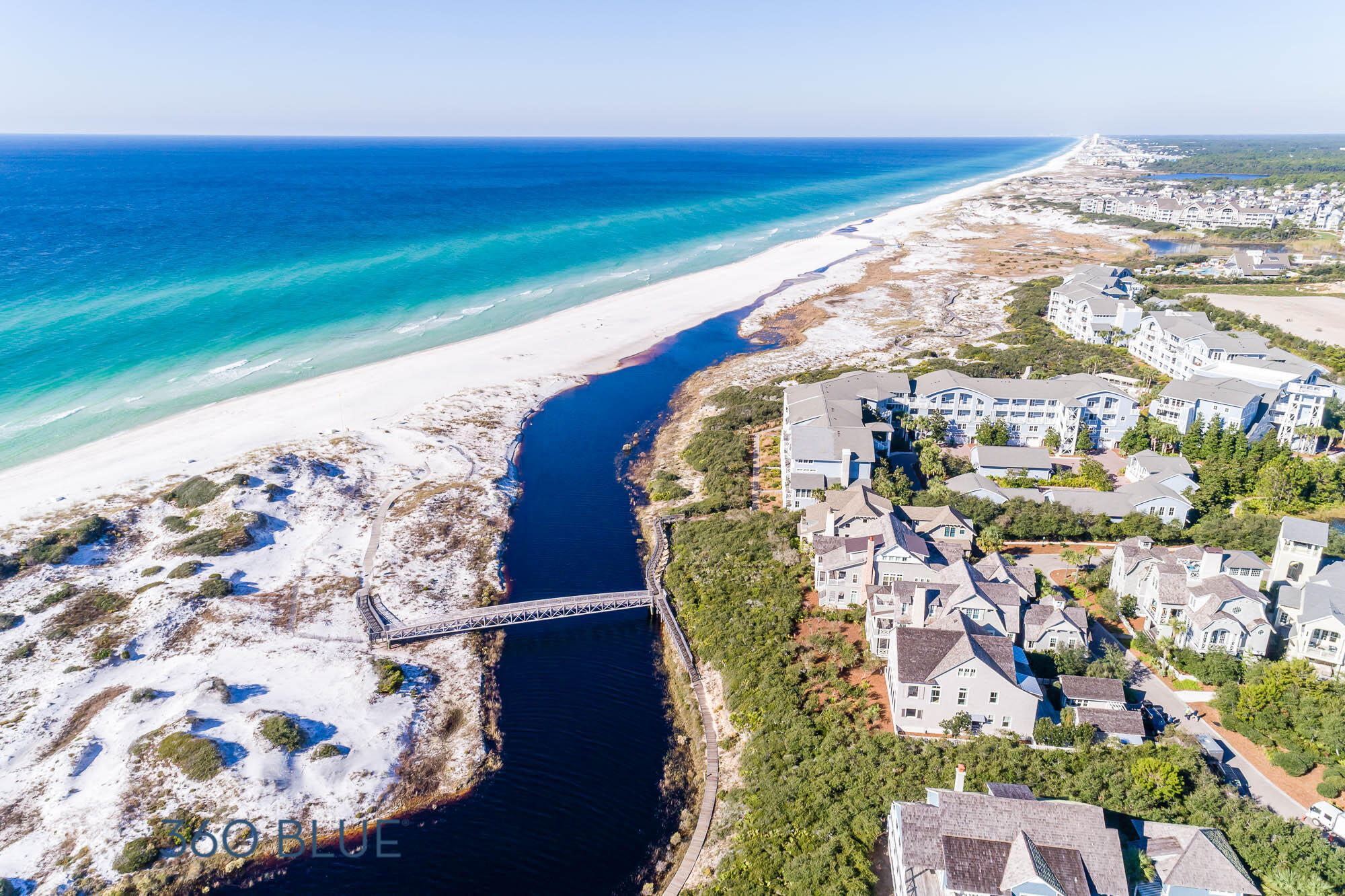 100 Bridge Lane, Unit C112 Watersound, FL 32461 - Photo 41 of 43 a view of a balcony with floor to ceiling windows with wooden floor