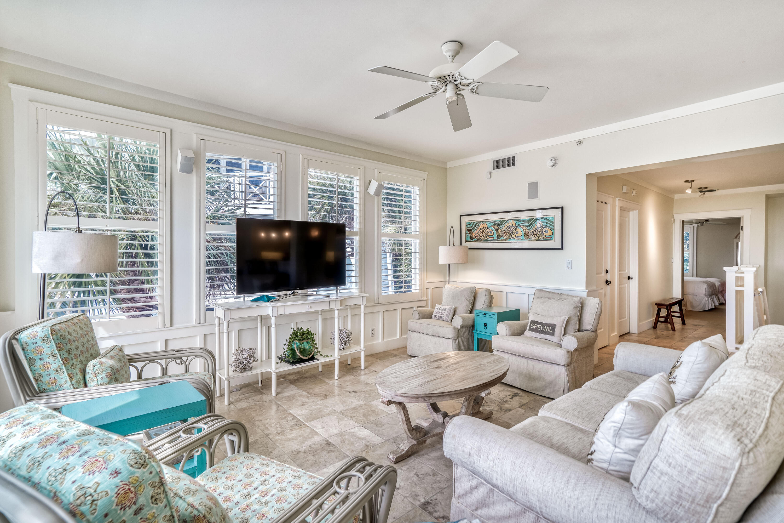 100 Bridge Lane, Unit C112 Watersound, FL 32461 - Photo 6 of 43 a living room with furniture and a flat screen tv