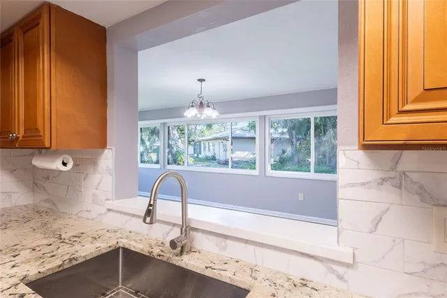 a bathroom with a bathtub and a sink
