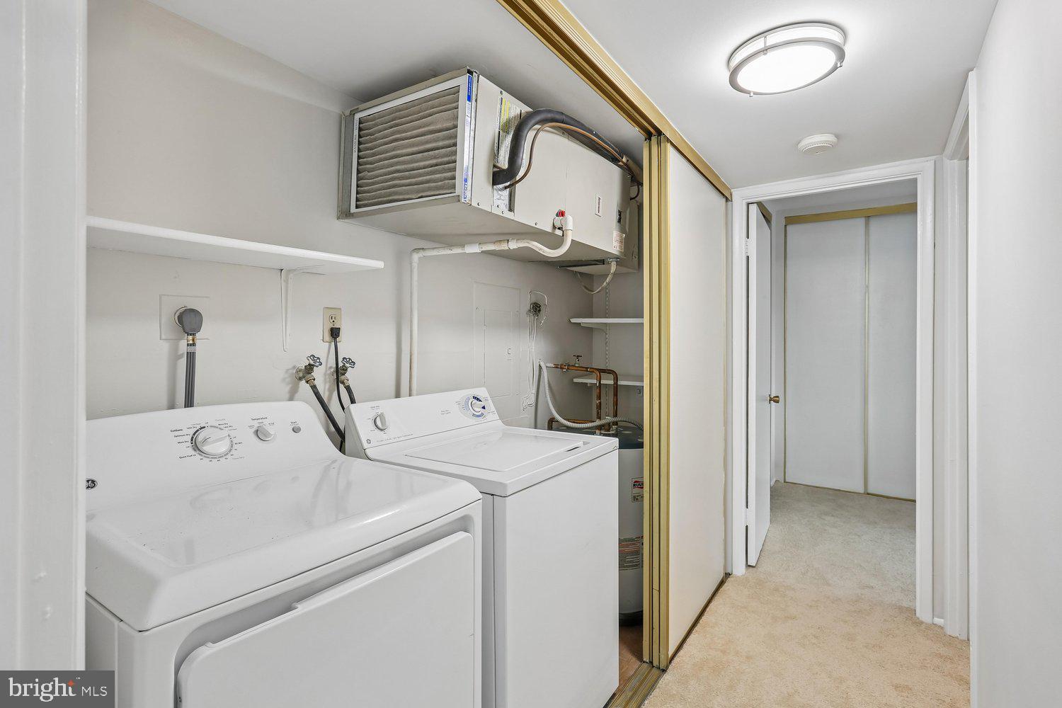 15020 Eardley Court, Unit 281G Silver Spring, MD 20906 - Photo 20 of 20 a utility room with dryer and washer
