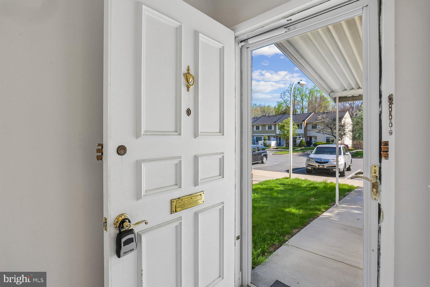 15020 Eardley Court, Unit 281G Silver Spring, MD 20906 - Photo 2 of 20 a view of an entryway with garden