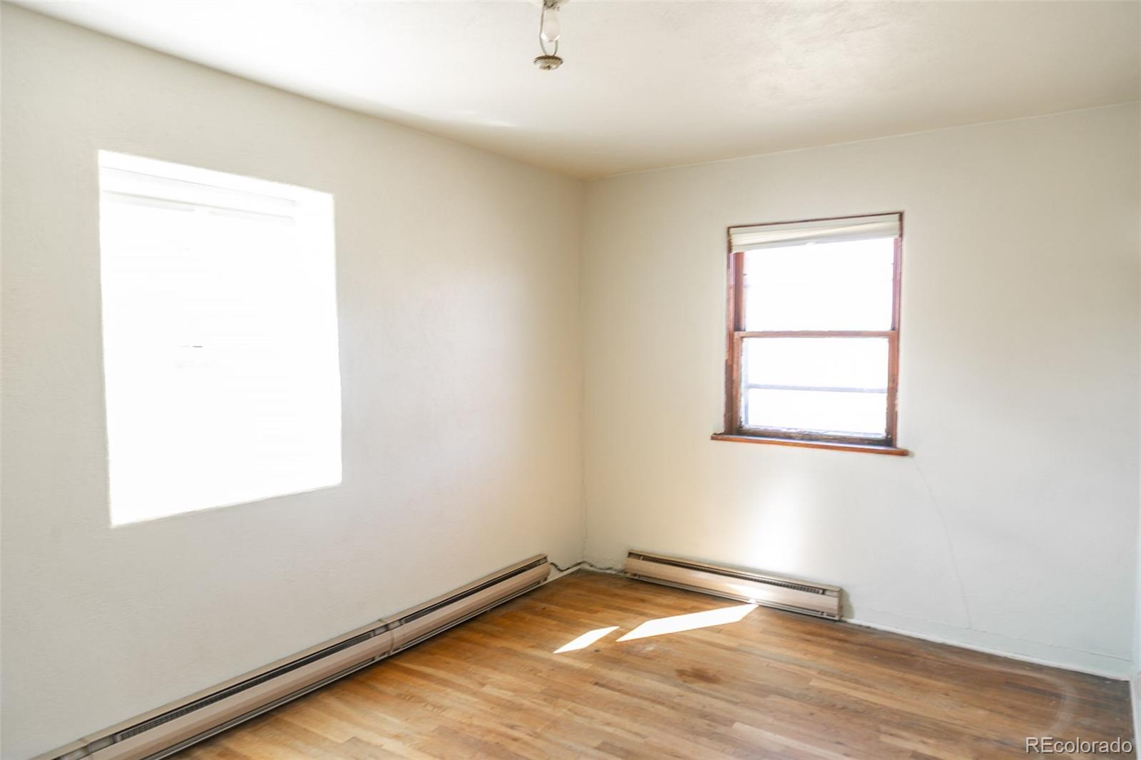 6771 West County Road Del Norte, CO 81132 - Photo 18 of 49 an empty room with a window