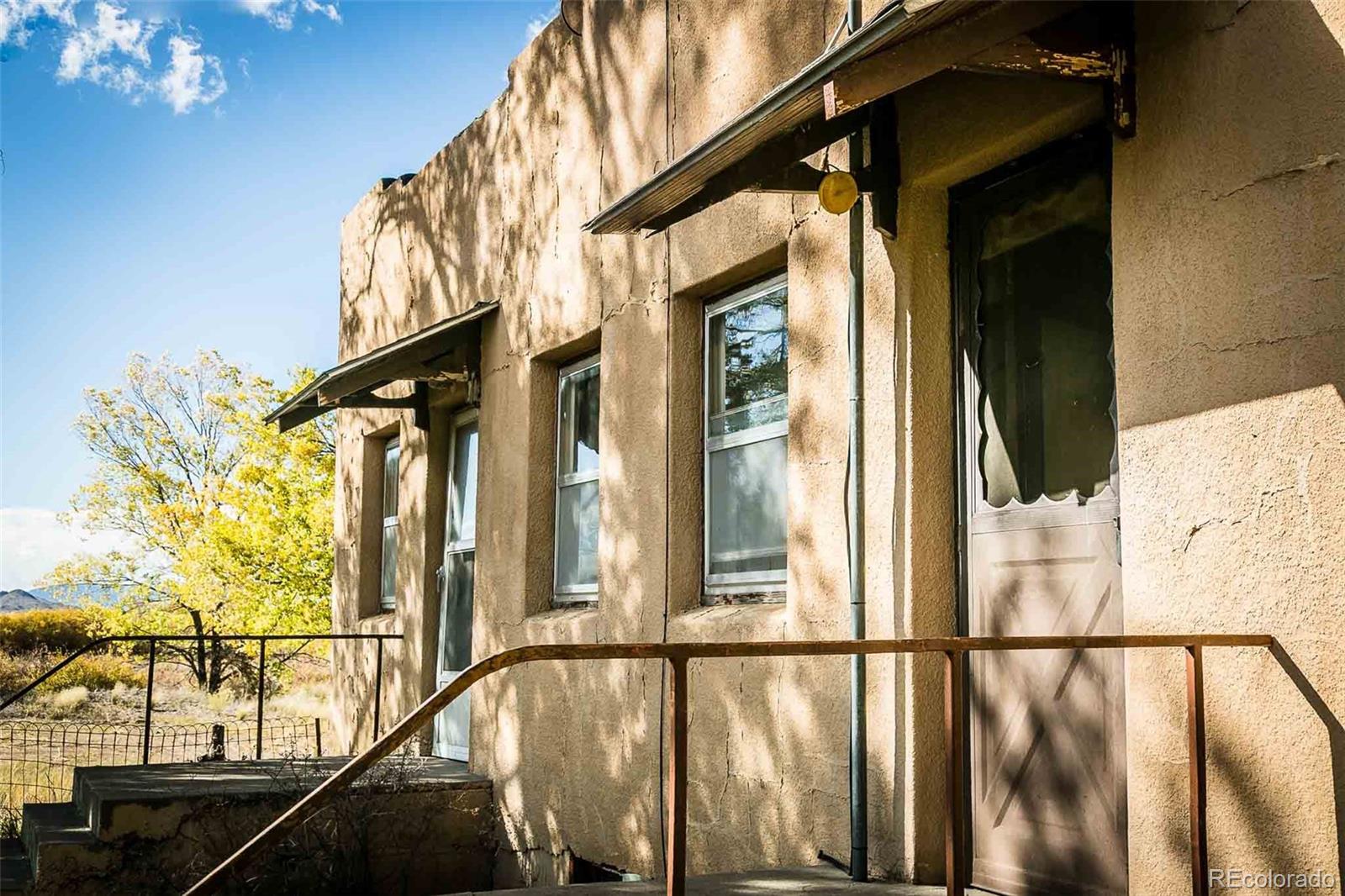 6771 West County Road Del Norte, CO 81132 - Photo 4 of 49 a view of balcony with wooden floor