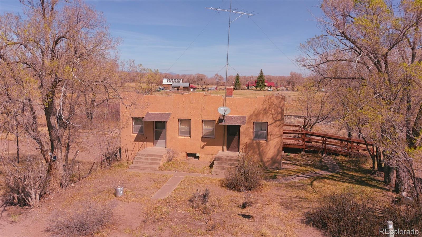 6771 West County Road Del Norte, CO 81132 - Photo 47 of 50 a view of a yard with chairs