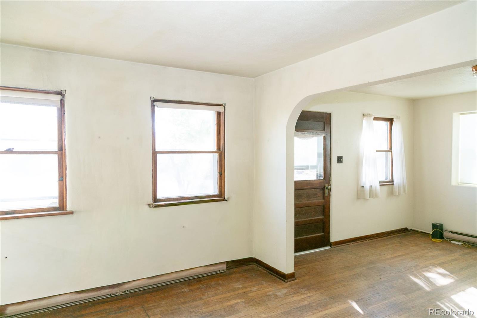 6771 West County Road Del Norte, CO 81132 - Photo 9 of 49 an empty room with windows