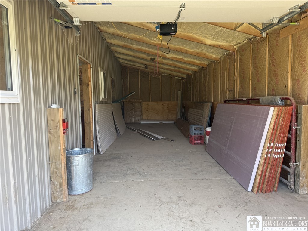 1546 Swede Road Harmony, NY 14710 - Photo 22 of 49 open garage off the livestock barn