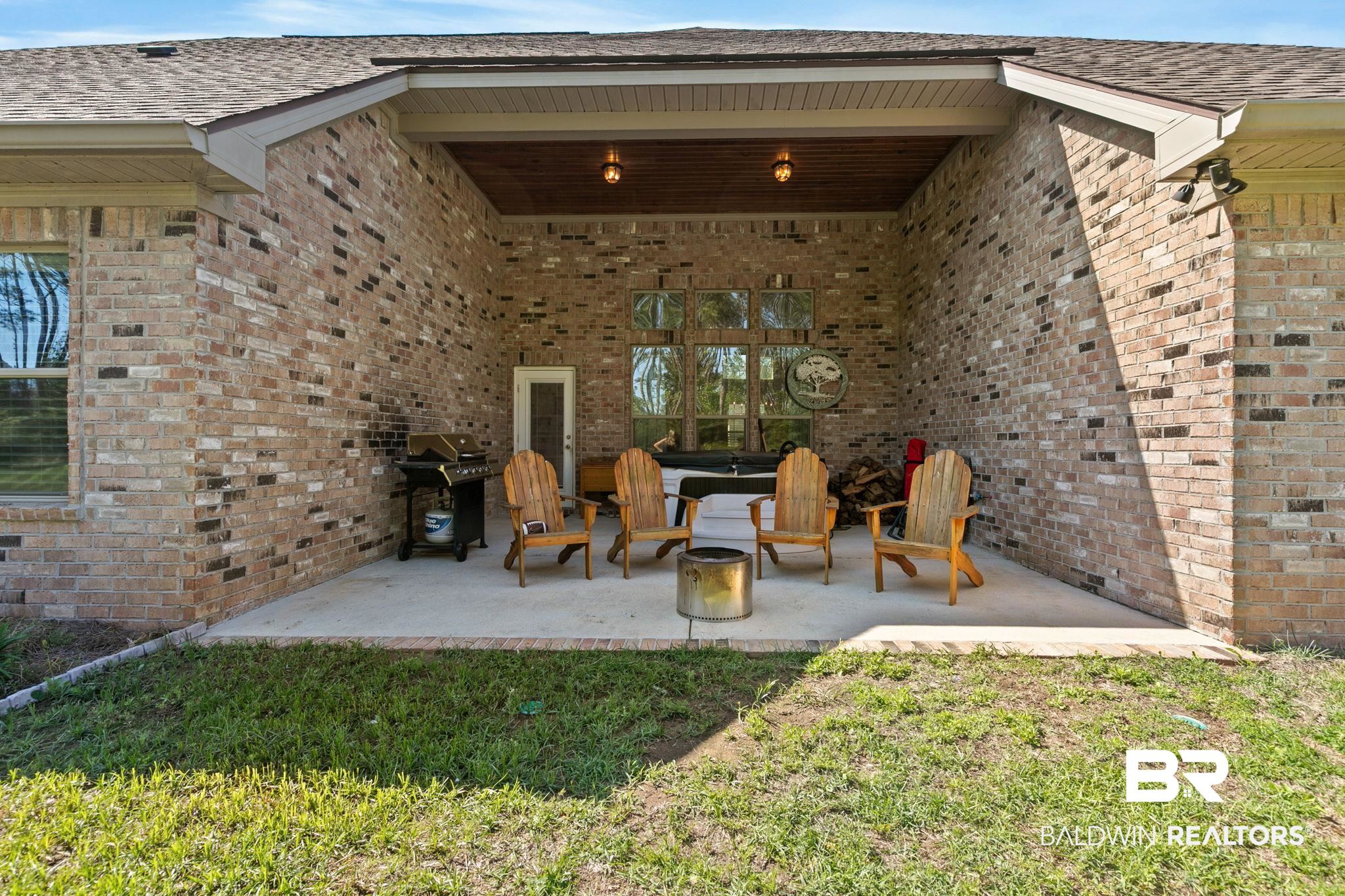 31911 Bobwhite Road Daphne, AL 36527 - Photo 47 of 85 View of patio / terrace featuring a grill
