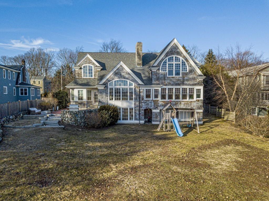 118 Marrett Road Lexington, MA 02421 - Photo 1 of 38 a view of a house with a yard and sitting area