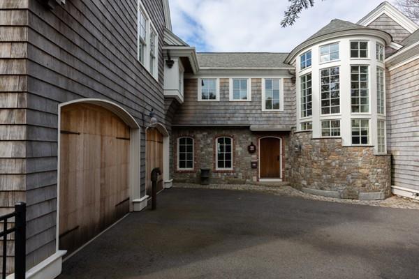 118 Marrett Road Lexington, MA 02421 - Photo 5 of 38 a front view of a house with a garage