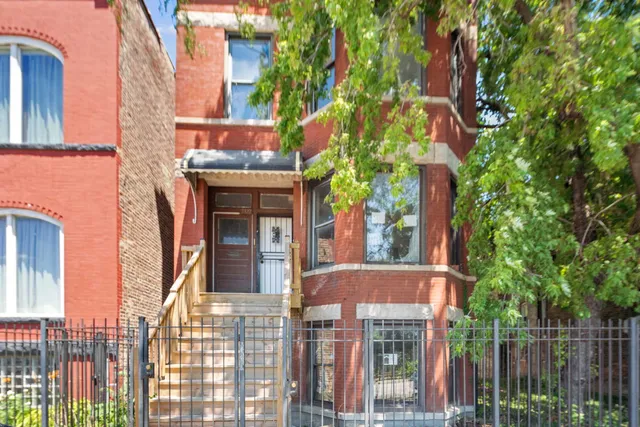 front view of a house with a small yard
