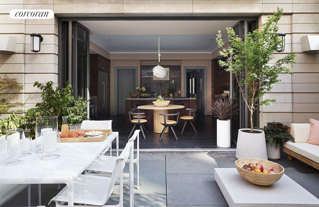 135 West 11th Street Manhattan, NY 10011 - Photo 1 of 1 a view of a dining room and hall with furniture