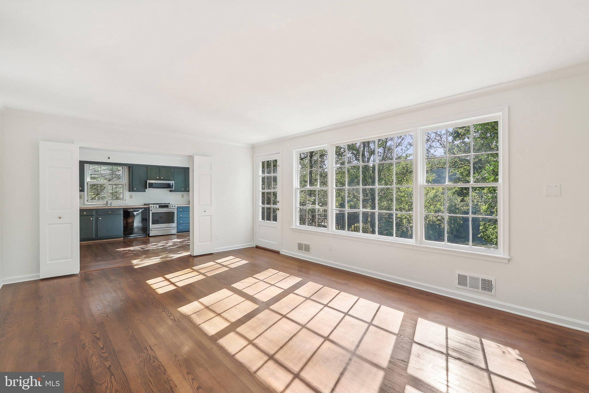 4405 Boxwood Road Bethesda, MD 20816 - Photo 6 of 58 Wall of windows with scenic views