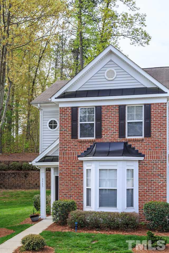 8485 Central Drive Raleigh, NC 27613 - Photo 2 of 25 a front view of a house with a yard