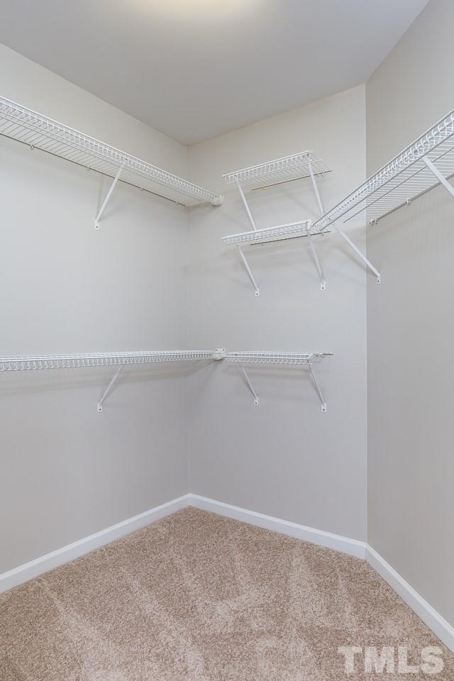 8485 Central Drive Raleigh, NC 27613 - Photo 13 of 25 a view of an empty walk in closet