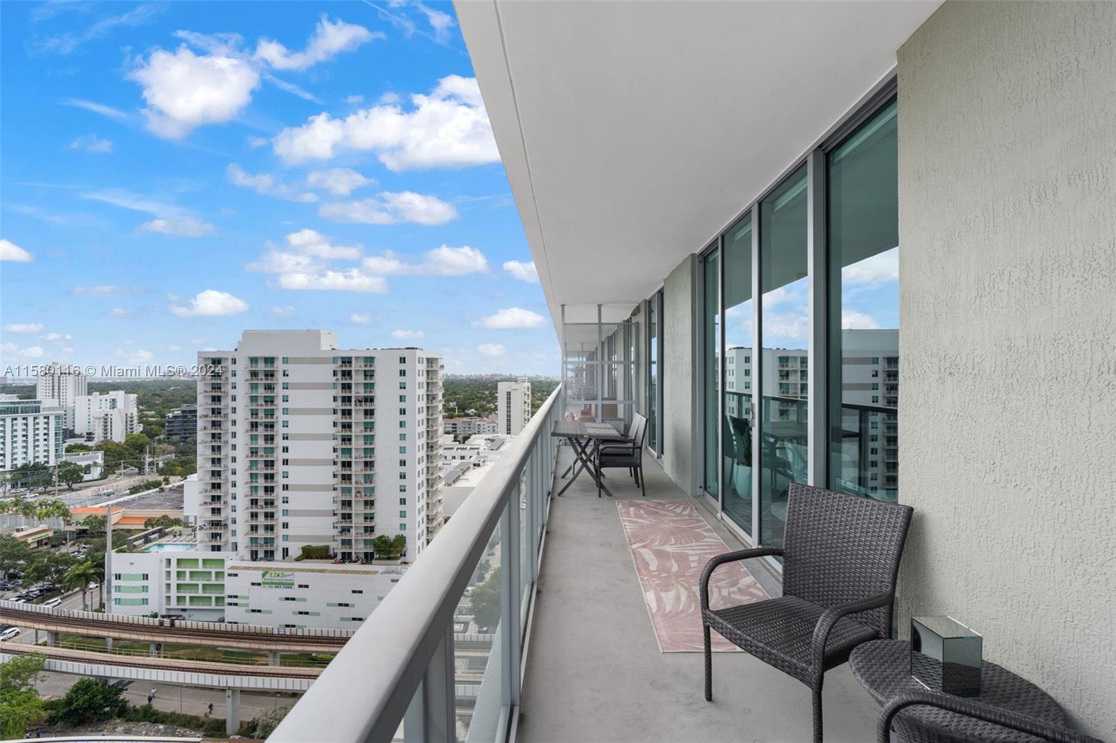 79 Southwest 12th Street, Unit 2204S Miami, FL 33130 - Photo 24 of 40 a view of balcony with couch