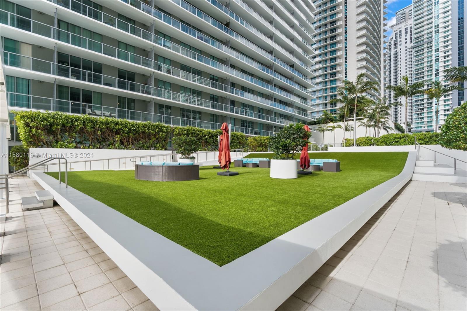 79 Southwest 12th Street, Unit 2204S Miami, FL 33130 - Photo 38 of 40 a view of building with outdoor space