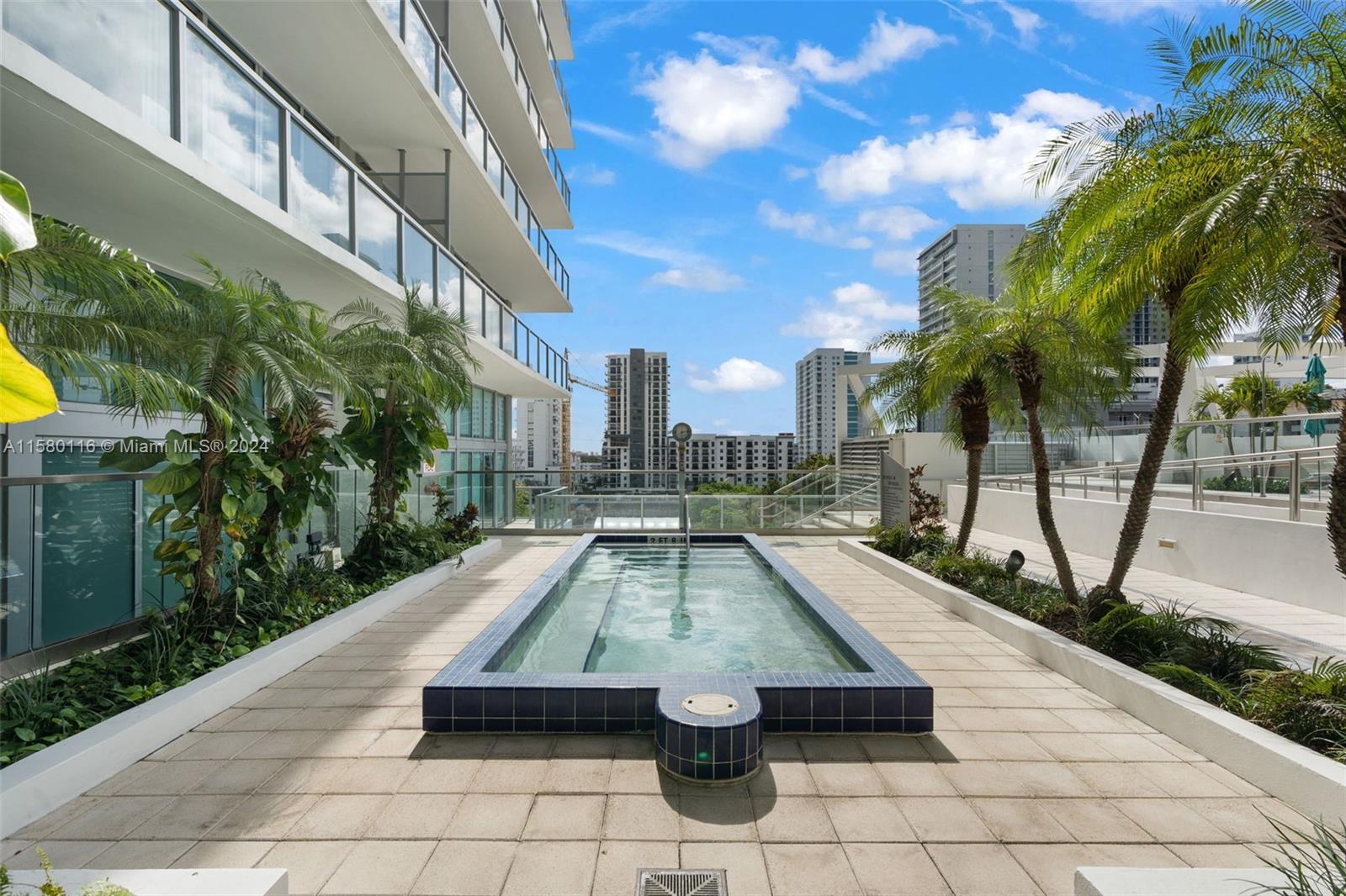 79 Southwest 12th Street, Unit 2204S Miami, FL 33130 - Photo 39 of 40 a view of outdoor space with swimming pool