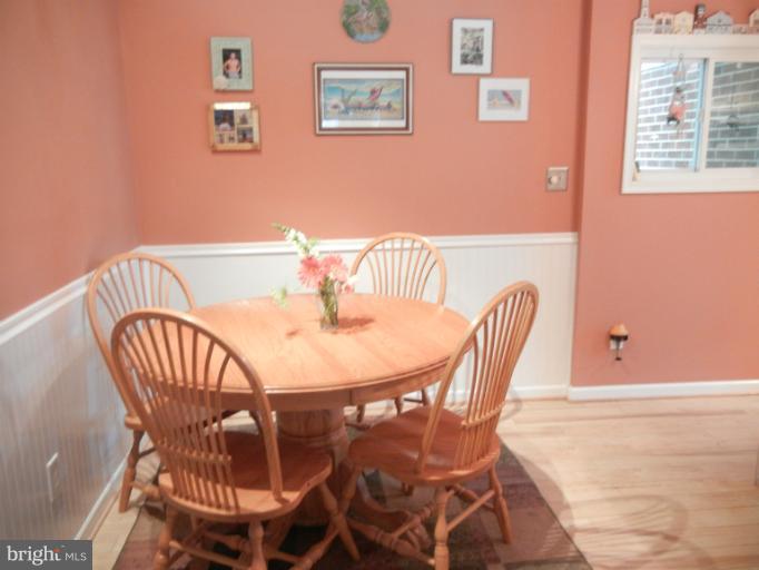 4040 Cliffvale Road Baltimore, MD 21236 - Photo 14 of 25 a view of a dining room with furniture and window