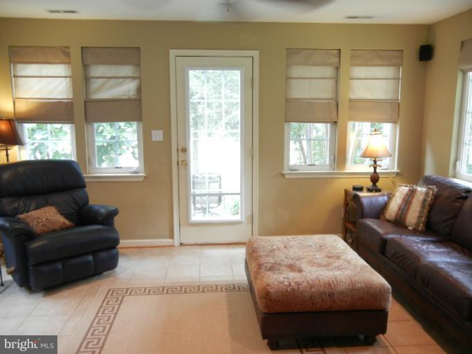4040 Cliffvale Road Baltimore, MD 21236 - Photo 19 of 25 a living room with furniture and a window