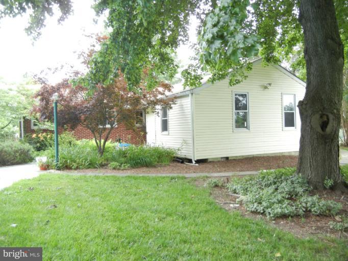 4040 Cliffvale Road Baltimore, MD 21236 - Photo 24 of 25 a view of backyard of house with green space