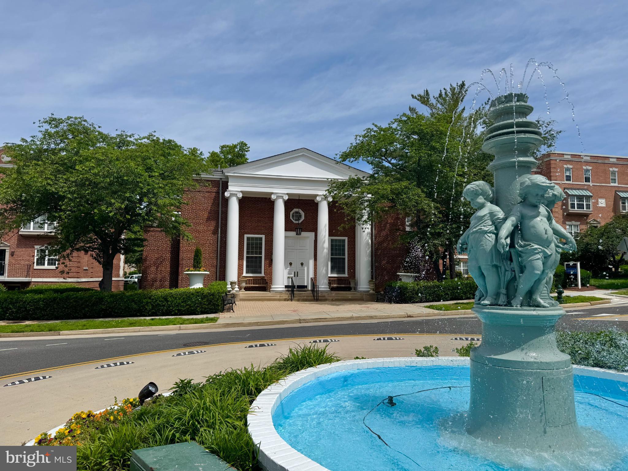 3811 39th Street Northwest, Unit D88 Washington, DC 20016 - Photo 18 of 20 Charming fountain graces a classic facade.