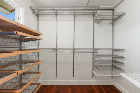 a view of a room with racks on the wall