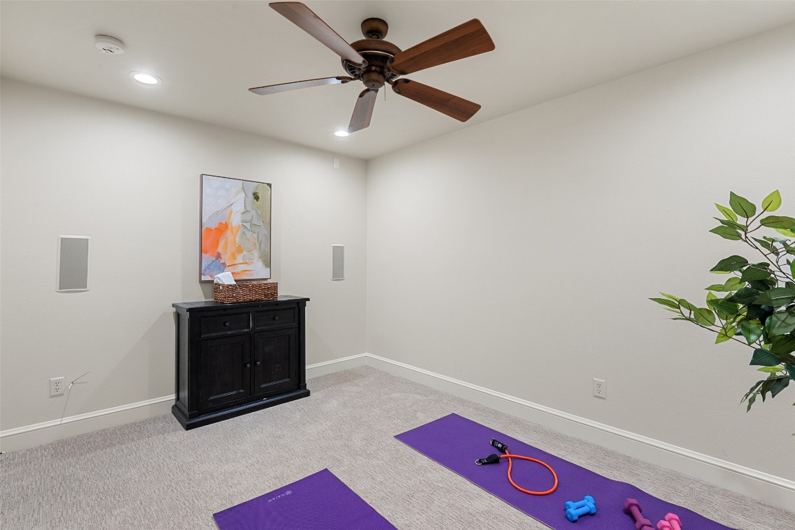 7603 Rustling Cove Austin, TX 78731 - Photo 27 of 34 a living room with furniture and a potted plant