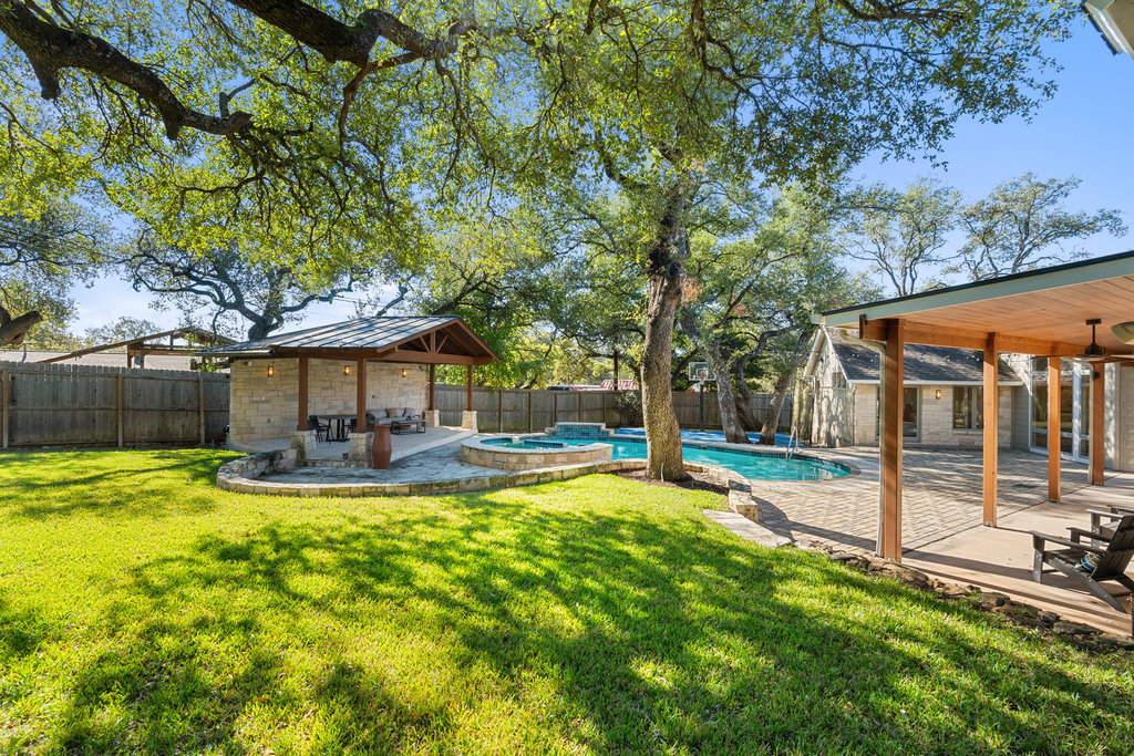 7603 Rustling Cove Austin, TX 78731 - Photo 29 of 34 a view of a house with swimming pool and sitting area