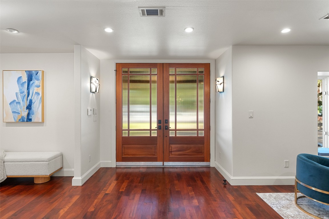7603 Rustling Cove Austin, TX 78731 - Photo 4 of 34 a view of livingroom with furniture and wooden floor