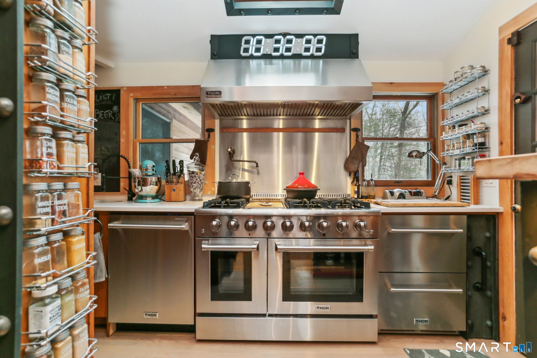 142 Seventy Acre Road Redding, CT 06896 - Photo 4 of 40 a kitchen with stainless steel appliances granite countertop a stove and cabinets