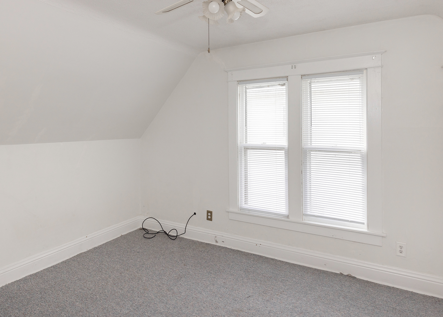 1839 15th Street Moline, IL 61265 - Photo 31 of 32 a view of an empty room with a window