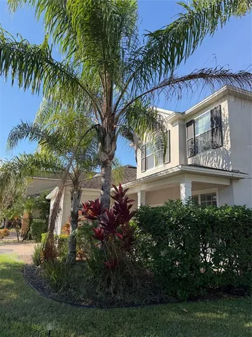 a view of a house with a garden