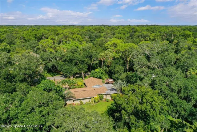 a view of swimming pool with a yard
