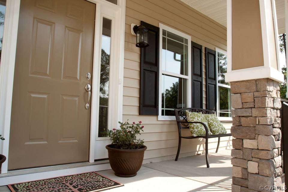 11024 Avening Road Midlothian, VA 23112 - Photo 2 of 16 a view of a entryway door front of house