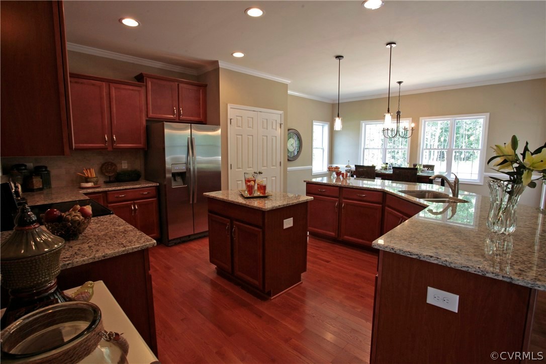 11024 Avening Road Midlothian, VA 23112 - Photo 7 of 16 a kitchen with a sink stove and refrigerator