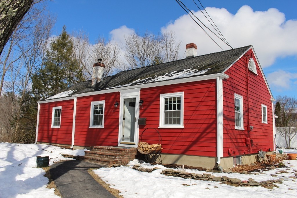 98 Old Ferry Road Haverhill, MA 01830 - Photo 2 of 14 a view of a brick house with many windows