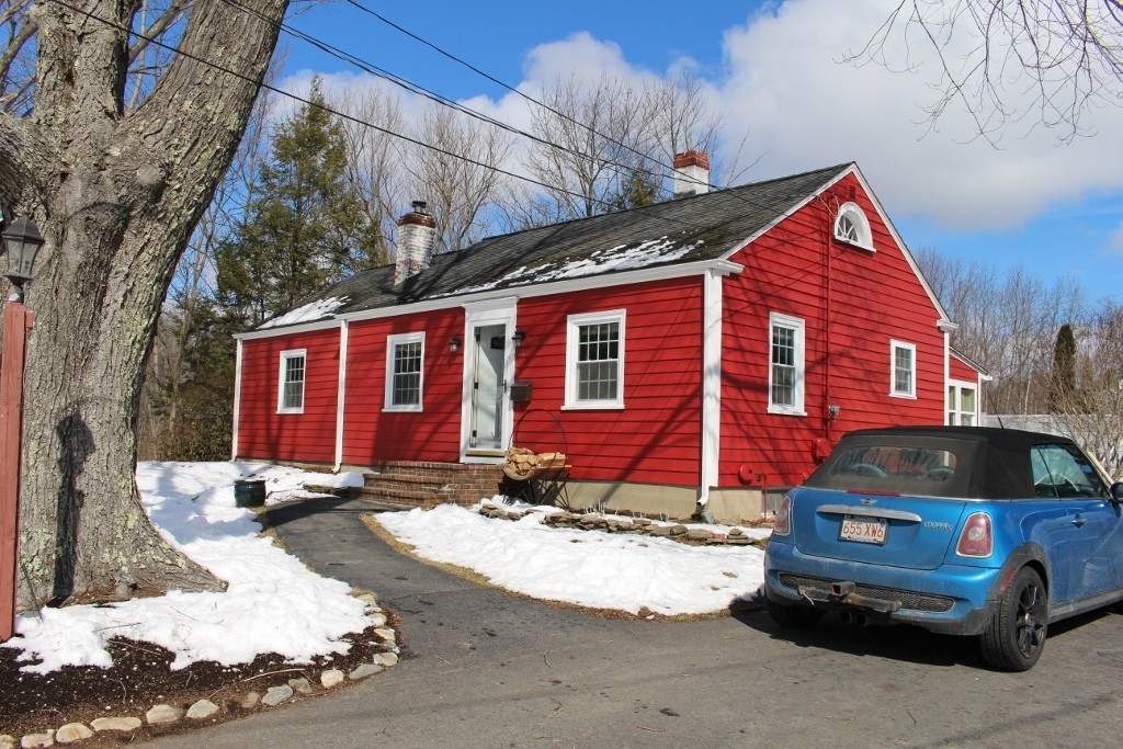 98 Old Ferry Road Haverhill, MA 01830 - Photo 3 of 14 a front view of a house with a yard covered with snow