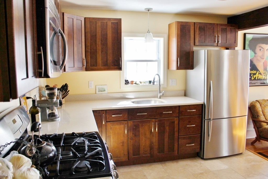 98 Old Ferry Road Haverhill, MA 01830 - Photo 10 of 14 a kitchen with a sink appliances and cabinets