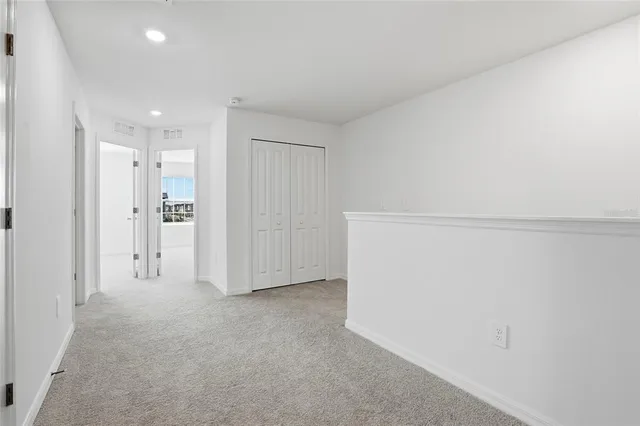 a view of a backyard with lake and mountain view