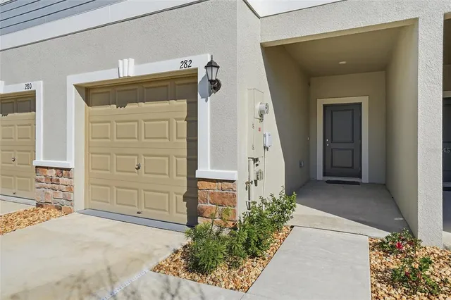 front view of a house with an outdoor space