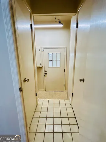 a bathroom with a toilet and a sink