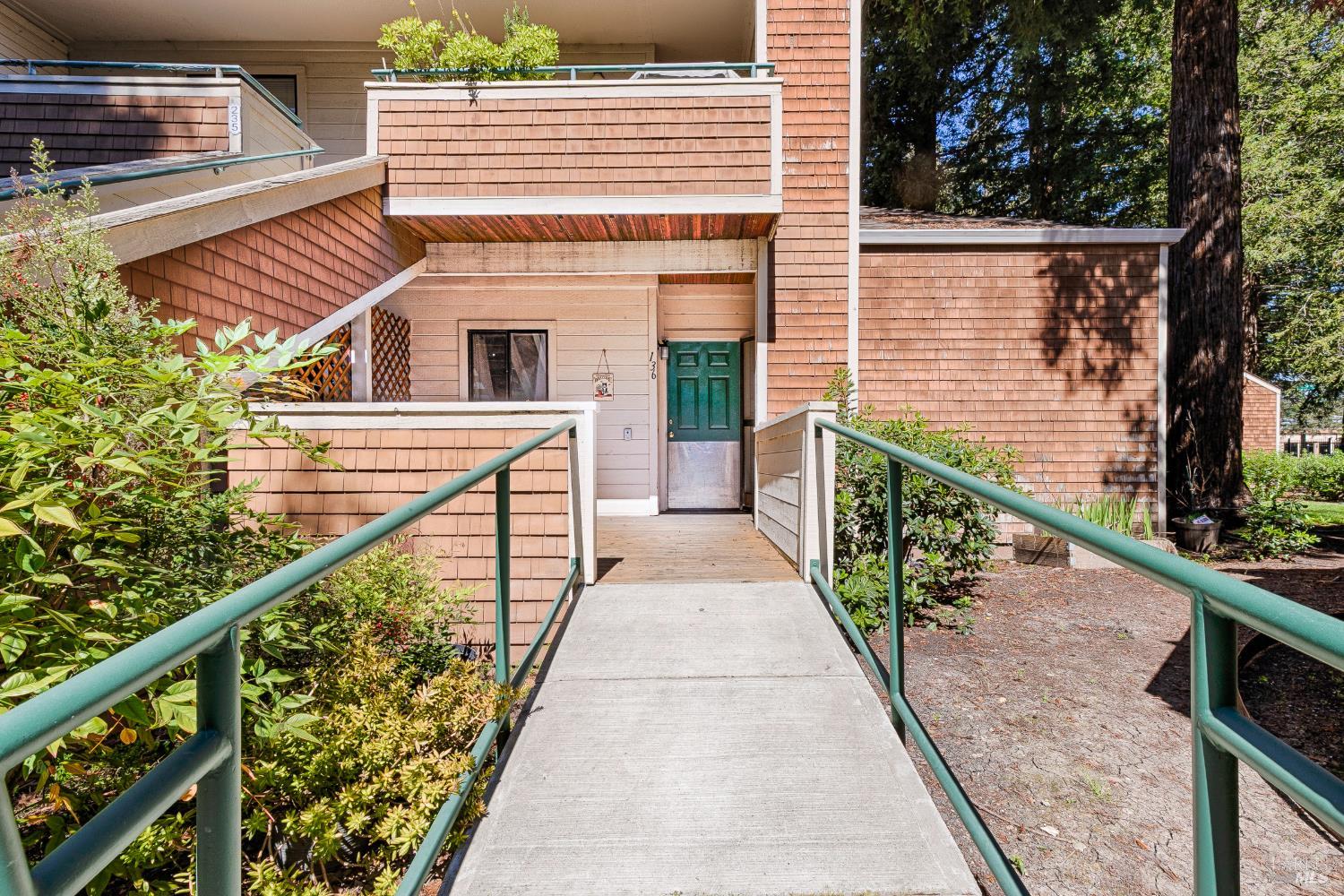 901 Russell Avenue, Unit 136 Santa Rosa, CA 95403 - Photo 2 of 34 There is a ramp to the front deck and front door. The front door has an auto opener.