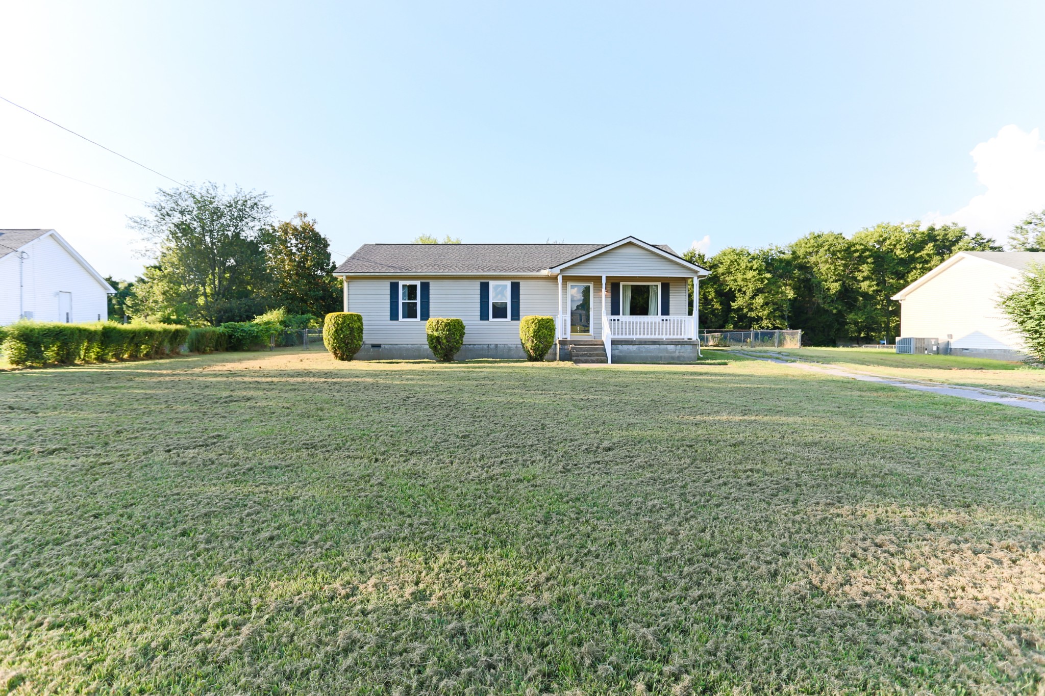 7460 Joe Rowlin Road Christiana, TN 37037 - Photo 2 of 26 a front view of a house with a yard
