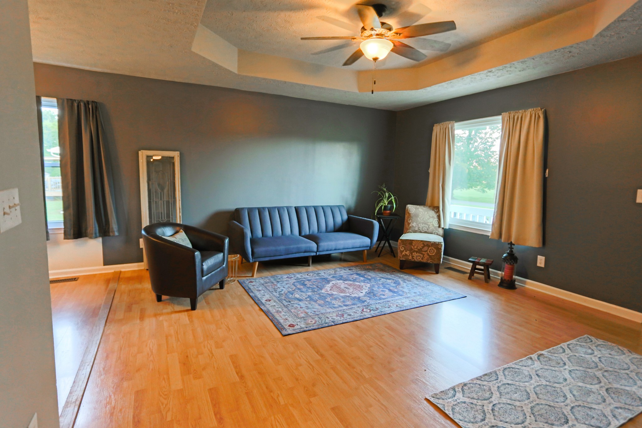 7460 Joe Rowlin Road Christiana, TN 37037 - Photo 7 of 26 a living room with furniture and wooden floor