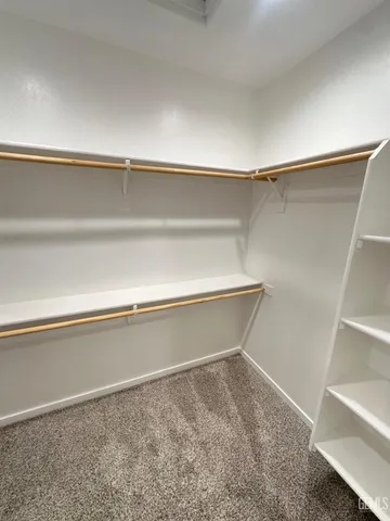 a view of small space with racks on the wall