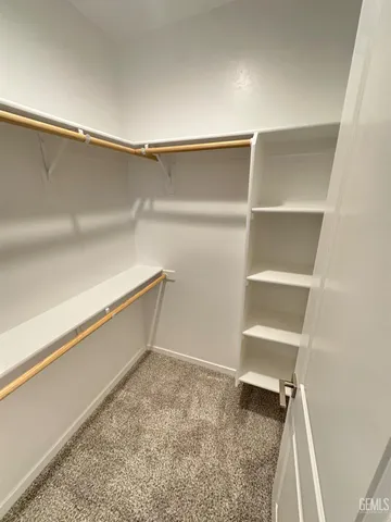 a view of room with walk in closet