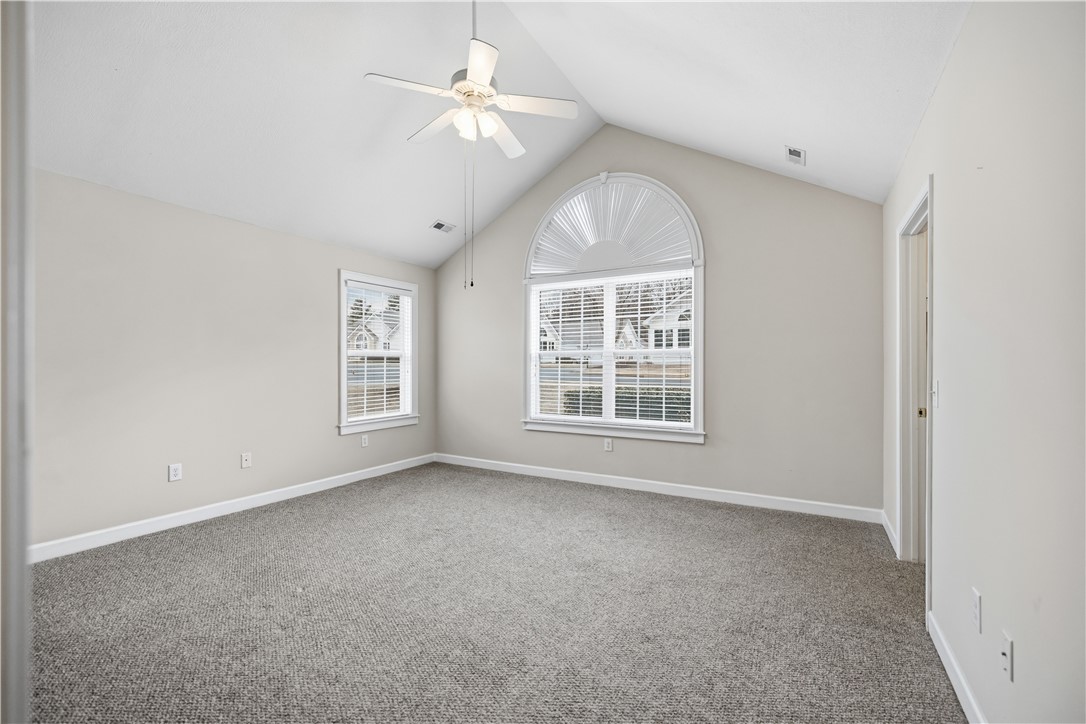 161 Life Style Lane Anderson, SC 29621 - Photo 10 of 22 This spacious bedroom offers abundant natural light and vaulted ceilings for an airy feel.