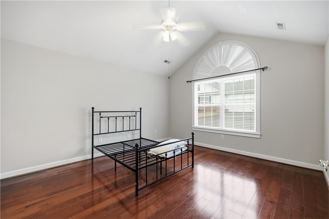 161 Life Style Lane Anderson, SC 29621 - Photo 16 of 22 This airy bedroom features gleaming wood floors and an elegant arched window.